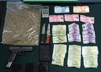Carabineros detuvo a dos colombianos que portaban drogas y armas